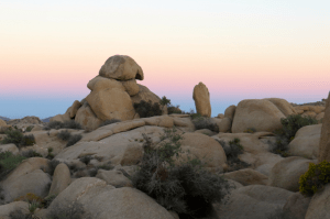 In the east you can see the blue mantel of evening beginning to appear on the horizon.