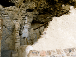 Partial wall and beams from the dwellings.