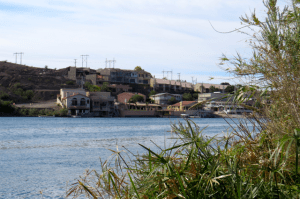 Lower Colorado River below Parker Dam. Houses and resorts line the river on both sides.