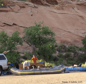 two guys preparing their equipment.