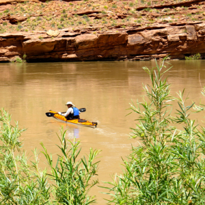Greg departing in his Kayak. Notice the color of the water here.