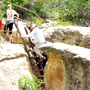 Climbing up after visiting the cliff dwelling.