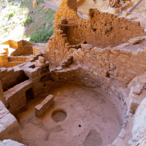 Looking down on an open Kiva one can see the fire pit, ventilation hole and shield. The small hole towards the left is called a sipapu and it is believed to be a ritual entrance from another world.